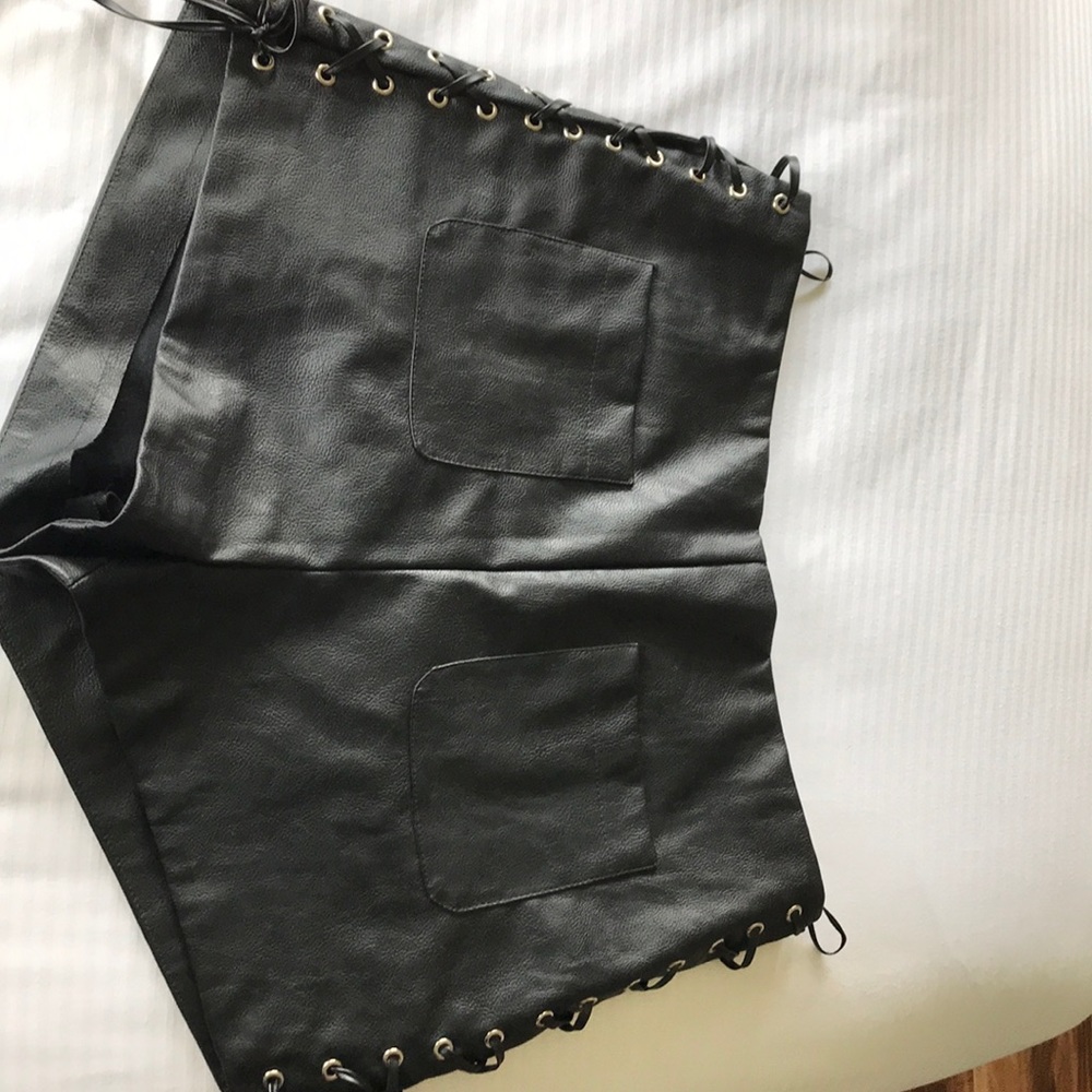 Black,  tight. corset type sides